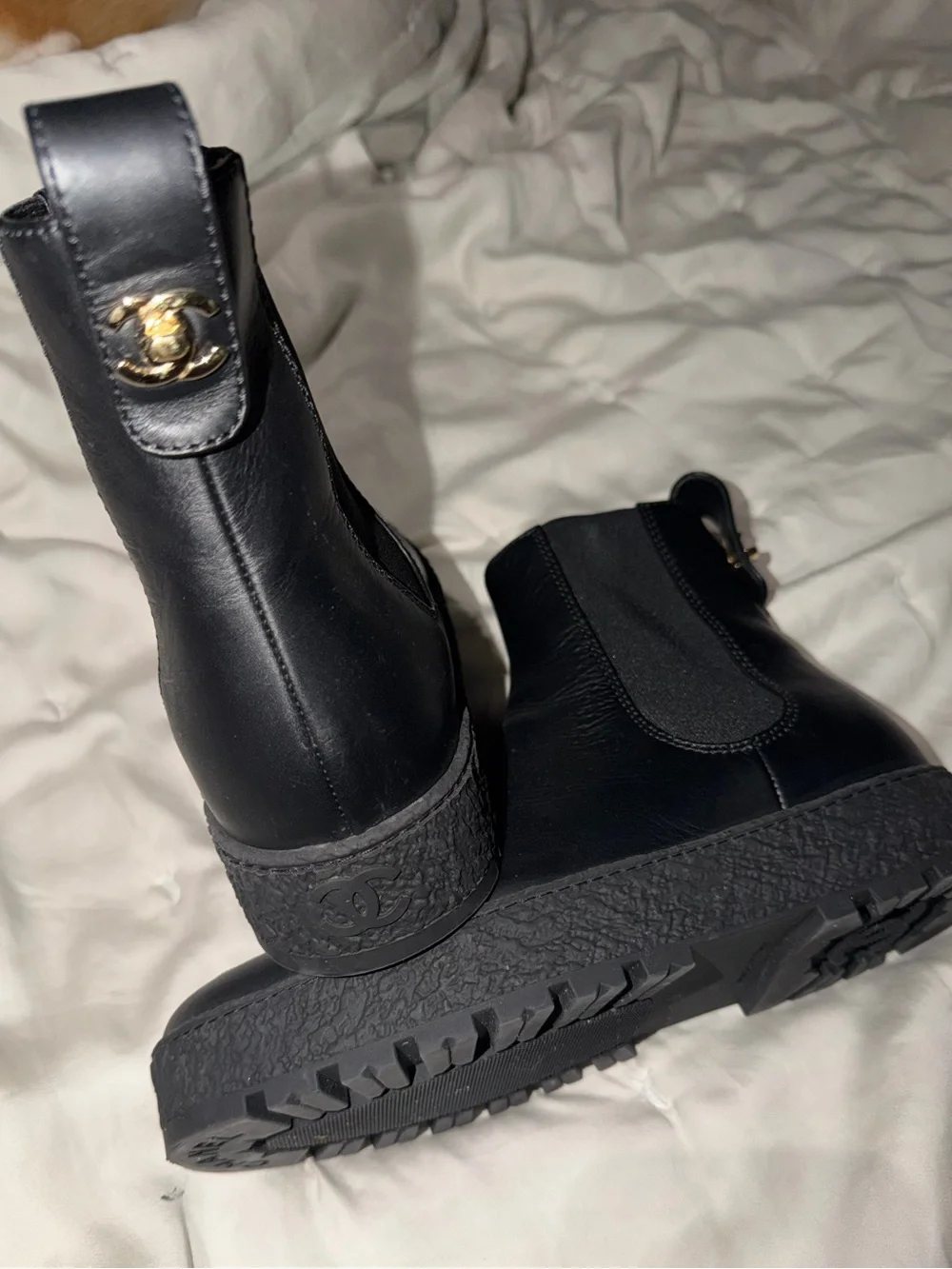 CHANEL Black Leather Platform Chelsea Booties with Gold CC Accent rubber sole
